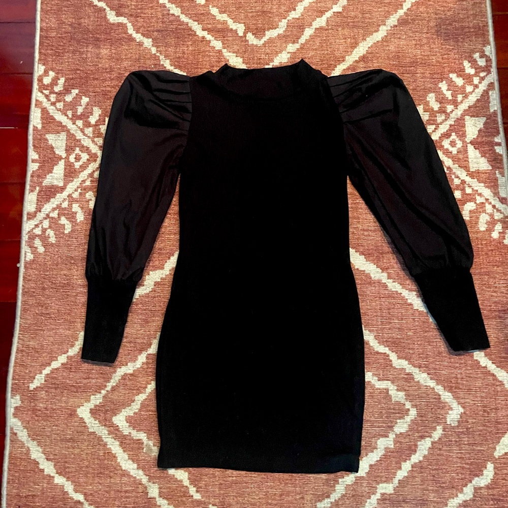Girls size 7 black dress with puffy sleeves